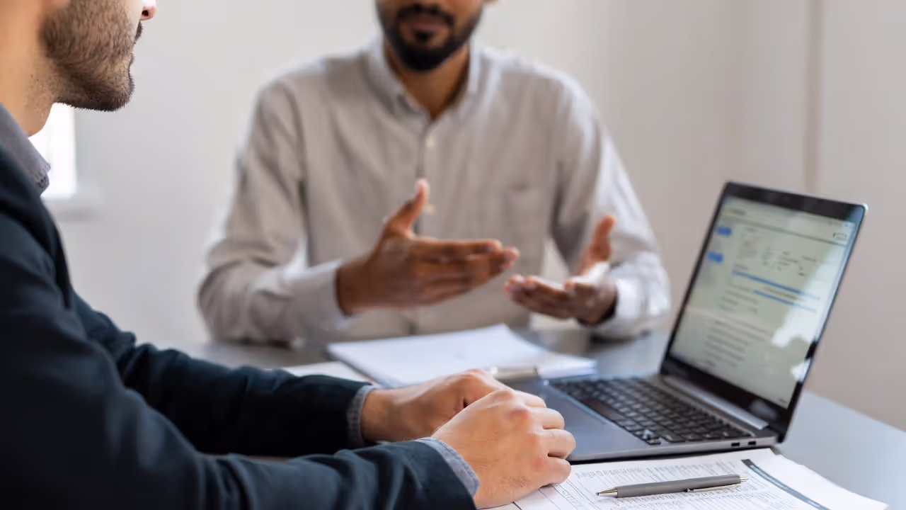 HR specialist helping an employee with workplace support and HR processes