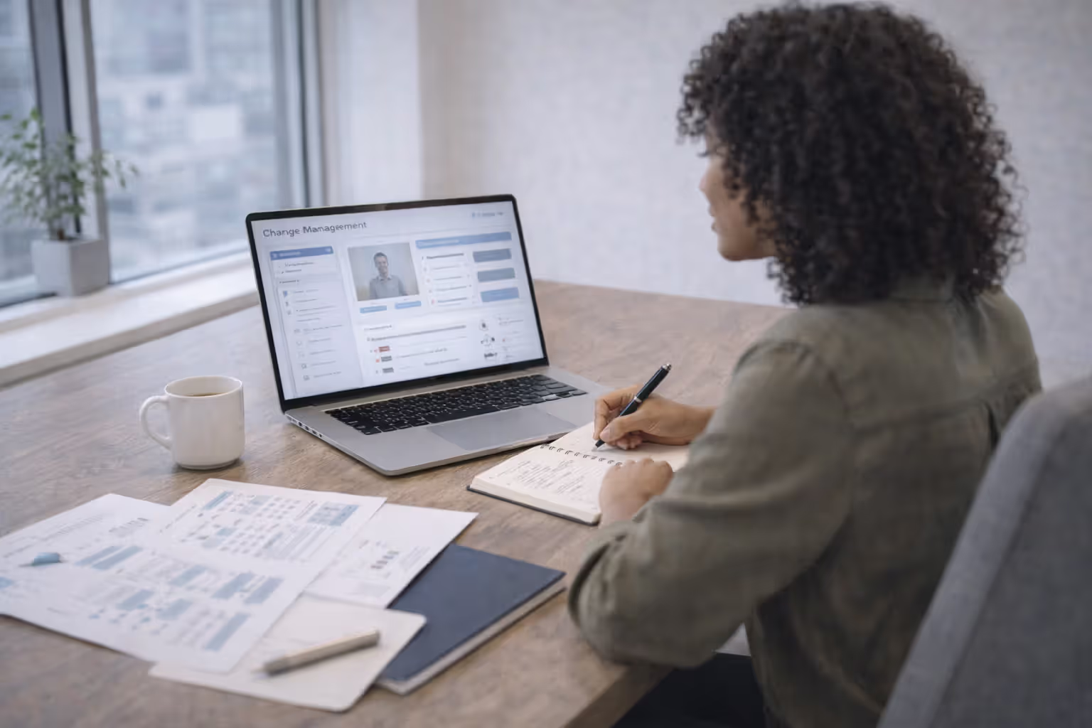 HR professional studying change management training materials